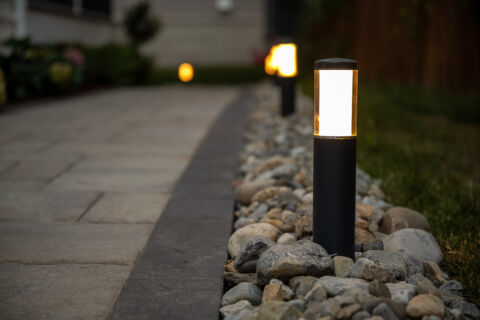 Outdoor lighting on walkway.