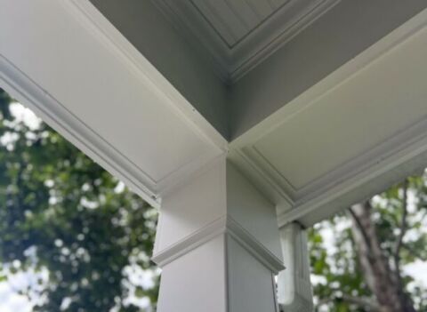 White PVC wrapped porch post with decorative molding on Arlington front porch