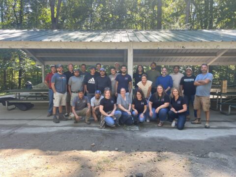 Core Outdoor Living team gathers for a company picnic at Burke Lake Park in Fairfax County, Virginia.
