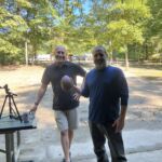 Core Outdoor Living team members enjoy football and outdoor activities at Burke Lake Park in Fairfax County.