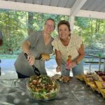 Core Outdoor Living team members share lunch and smiles at their Fairfax County company picnic.